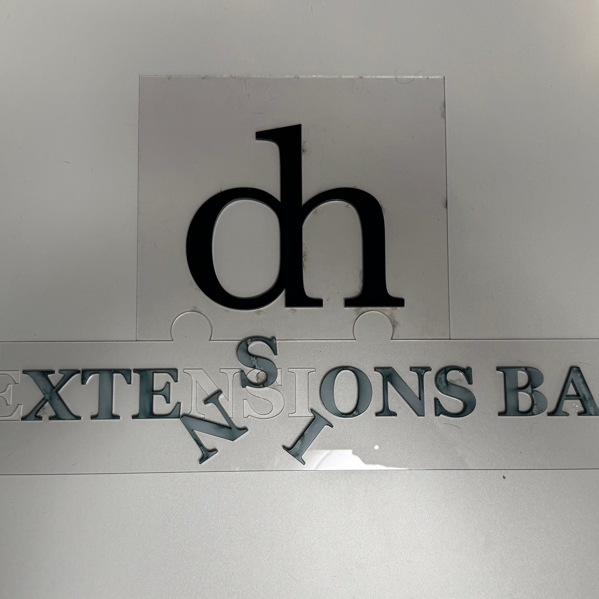 dh | acrylic sign